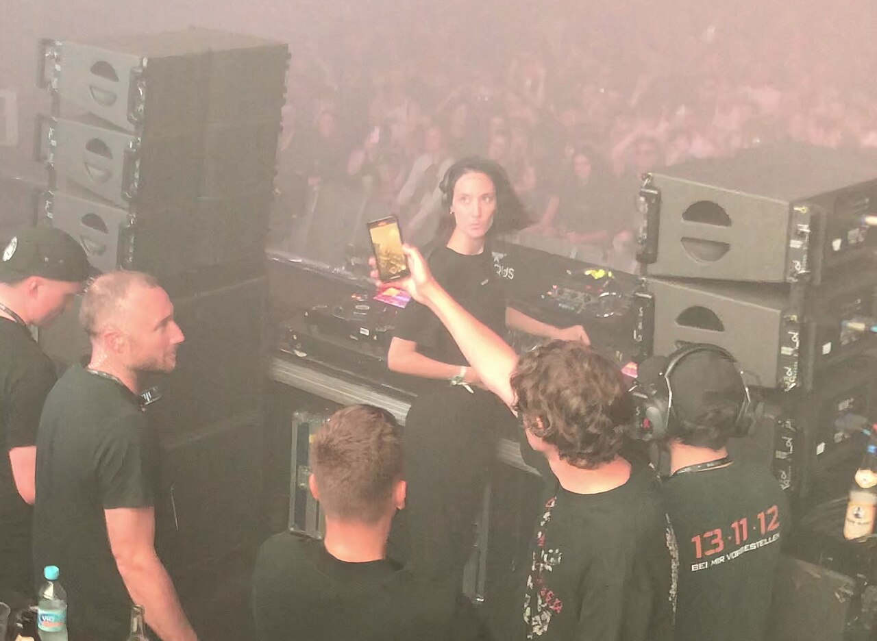 Amelie Lens performing behind the decks at Ikarus Festival in June 2022