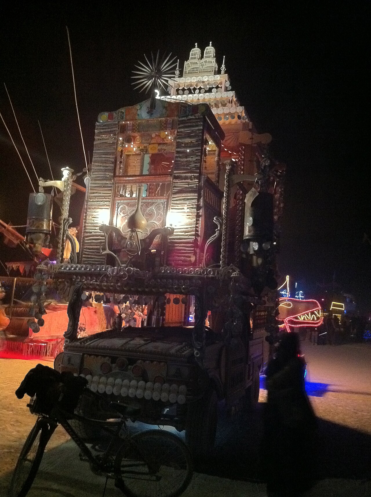 A heavily modified "mutant vehicle" art car cruising Black Rock City at Burning Man 2011. Photo by Victor Grigas, CC BY-SA 3.0, via Wikimedia Commons.