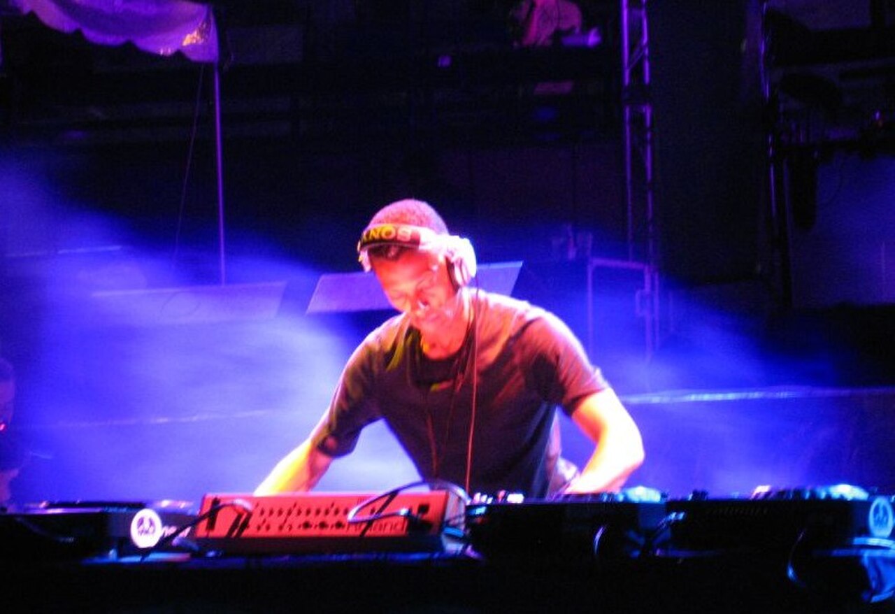 Jeff Mills wearing a cap and headphones while mixing at a club event in Detroit, 2007